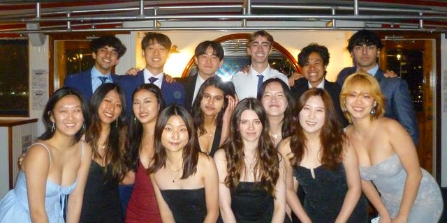 Friends dressed up and gathered together for a party portrait